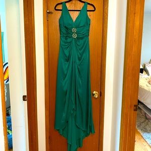Emerald green satin floor length dress with train. Fits like a size 6.